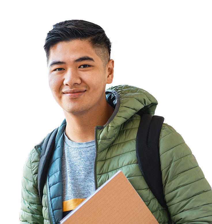 student holding a book and smiling